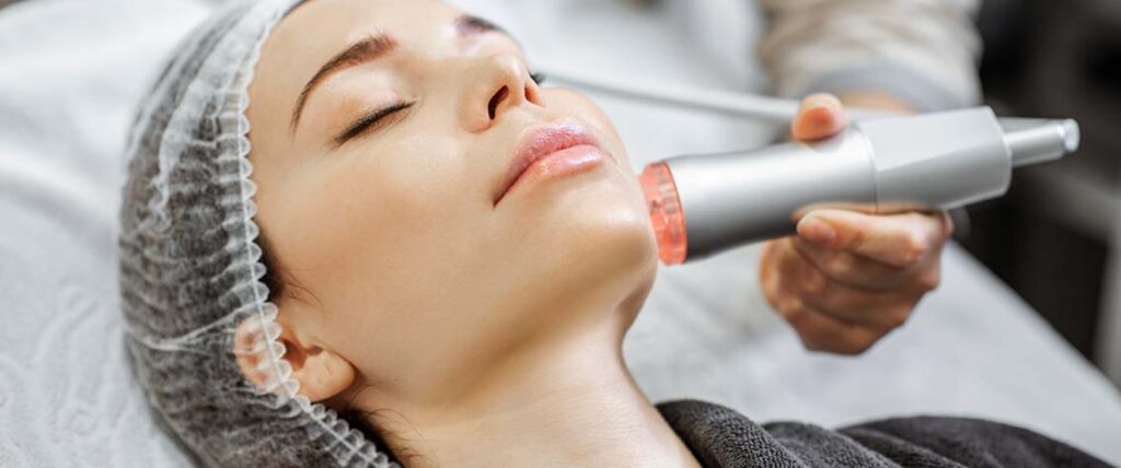 woman-during-the-facial-treatment-at-the-beauty-sa-2022-01-18-23-53-58-utc